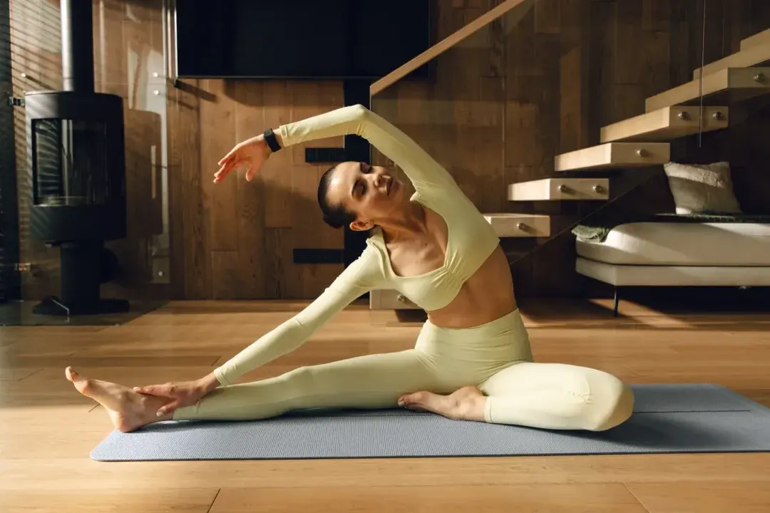 Woman in a yoga session wearing the Hume Band